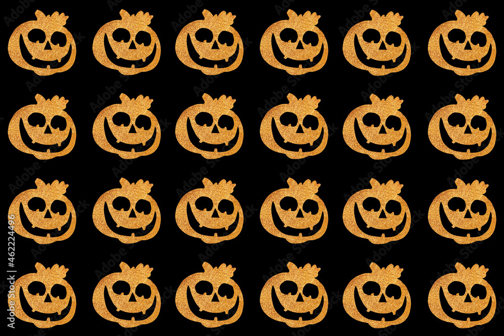 Seamless Halloween pattern. Pumpkin face on a black background. Top view Seamless Halloween pattern. Pumpkin face on a black background. Top view