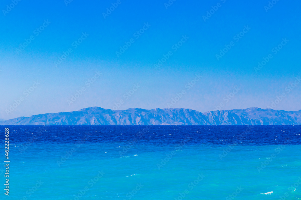 Elli beach landscape Rhodes Greece turquoise water and Turkey view.