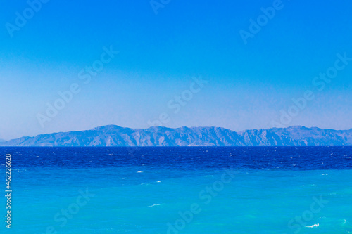 Elli beach landscape Rhodes Greece turquoise water and Turkey view. © arkadijschell