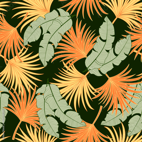 Beautiful seamless tropical pattern with bright plants and leaves on a green background. Beautiful exotic plants. Print with hand drawn exotic plants.