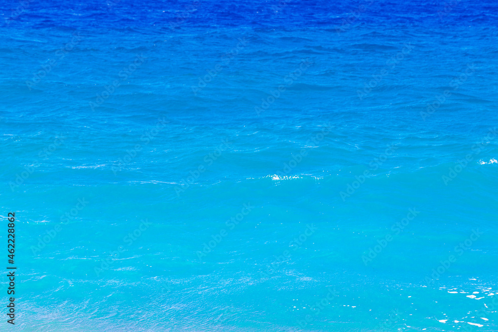 Elli beach texture of blue turquoise clear water Rhodes Greece.