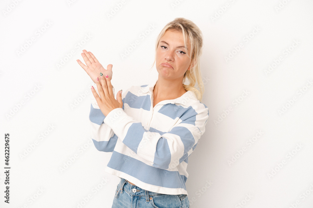 Young Russian woman isolated on white background feeling energetic and comfortable, rubbing hands confident. Young Russian woman isolated on white background feeling energetic and comfortable, rubbing hands confident.