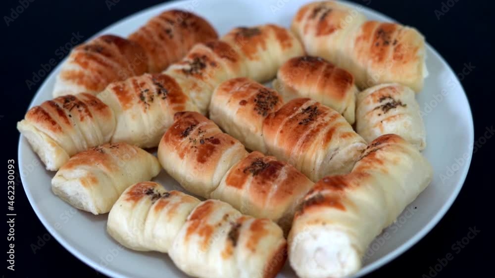 baked finger food on the white plate baked finger food on the white plate