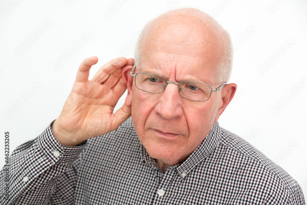 Senior suffering from deafness Senior suffering from deafness
