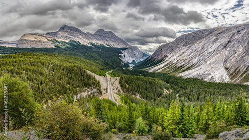 Stunning view of Icefields Parkway with Cirrus Mountain and Big Bend in Autumn between Banff and Jasper, Alberta, Canada photo