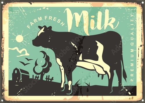 Farm fresh milk vintage sign design. Vintage cow graphic, countryside landscape and barn silhouette. Organic milk vector advertisement.