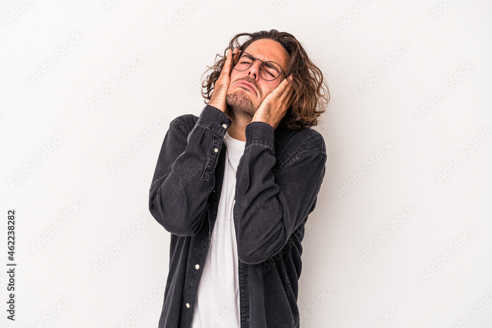 Young caucasian man isolated on white background whining and crying disconsolately. Young caucasian man isolated on white background whining and crying disconsolately.