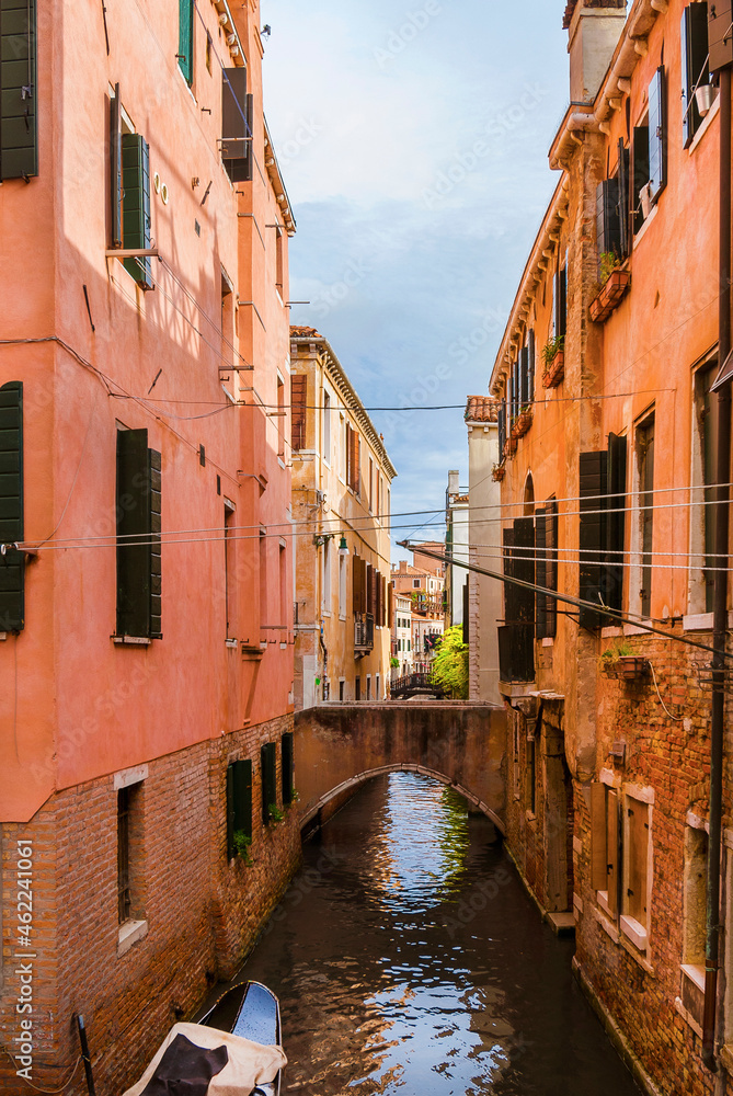 View of a characteristic Venice canal and old traditional houses in the quiet San Polo District