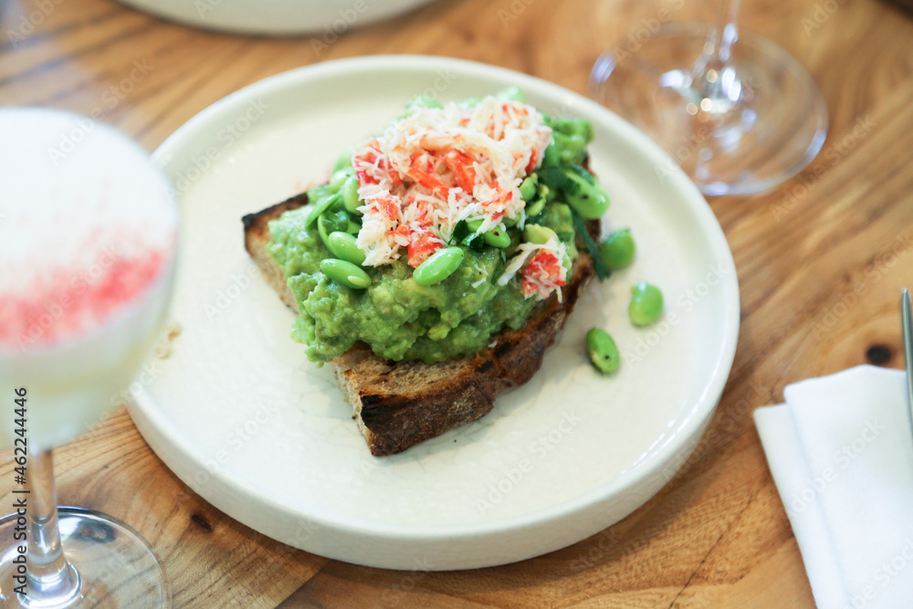 Healthy avocado toast with crab meat