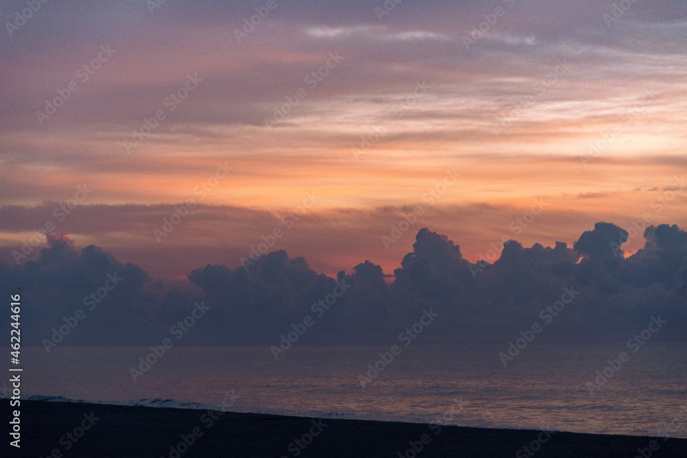 Sunrise over the waves of the Atlantic Ocean from Pawley's Island, South Carolina, USA
