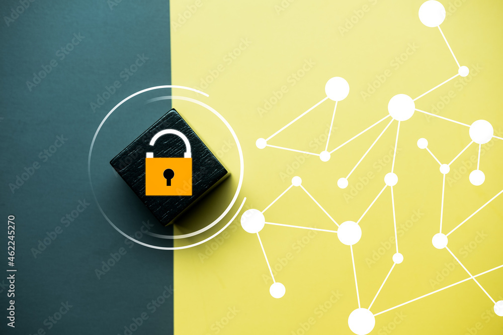 Open padlock icon on black wood block. Concept about security. Open padlock icon on black wood block. Concept about security.