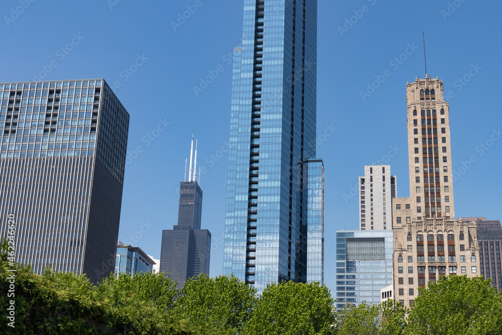 Old and Modern Downtown Chicago Skyscrapers with a Blue Sky Old and Modern Downtown Chicago Skyscrapers with a Blue Sky