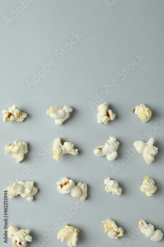 Flat lay with popcorn on light gray background