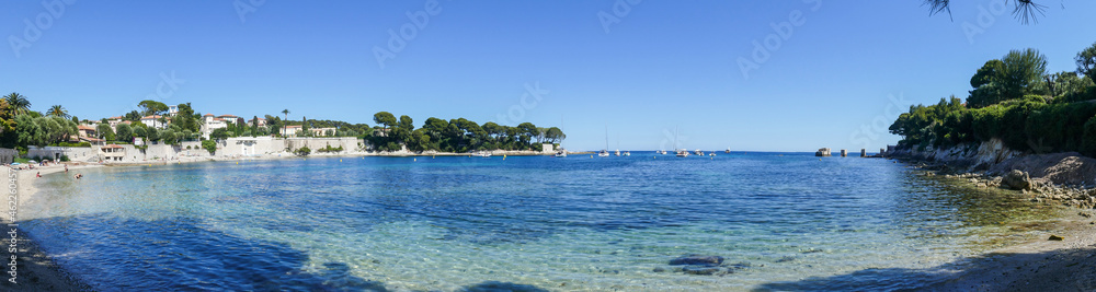 ra wide view of the beautiful Fosses Beach in Saint Jean Cap Ferrat with tropical colored water