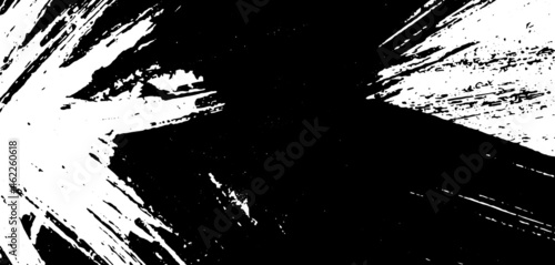 Black and white grunge background. Smears of black paint on white. The abstract backdrop is monochrome. Psychedelic Image