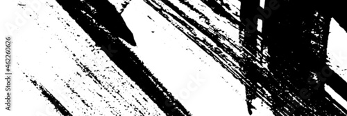 Black and white grunge background. Smears of black paint on white. The abstract backdrop is monochrome. Psychedelic Image