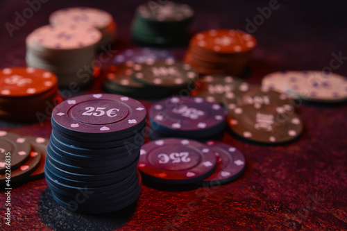 Poker chips on dark background