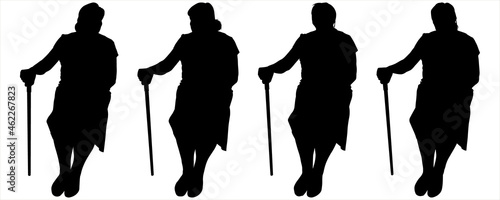 Black female silhouettes isolated on white background. Four women sit and chat, discuss, front view. An older woman sits with a cane in her hand. Friendship. Woman's friendship. Canes in hands.