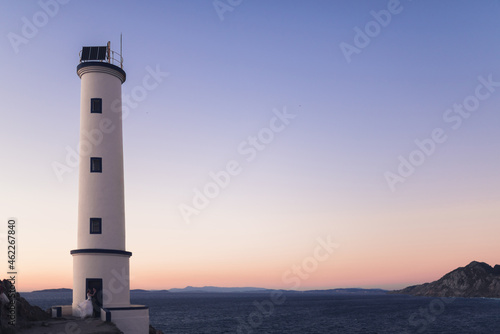 Wallpaper Mural Landscape with a lighthouse and a just married couple Torontodigital.ca