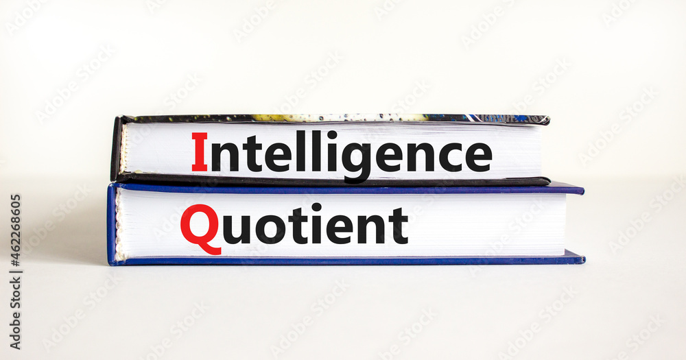 IQ intelligence quotient symbol. Concept words 'IQ intelligence quotient' on books on a beautiful white table, white background. Business, IQ intelligence quotient concept, copy space.