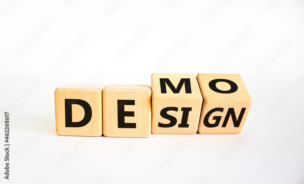 Demo and design symbol. Turned cubes and changed the word 'design' to 'demo'. Beautiful white background. Business demo and design concept. Copy space. Demo and design symbol. Turned cubes and changed the word 'design' to 'demo'. Beautiful white background. Business demo and design concept. Copy space.