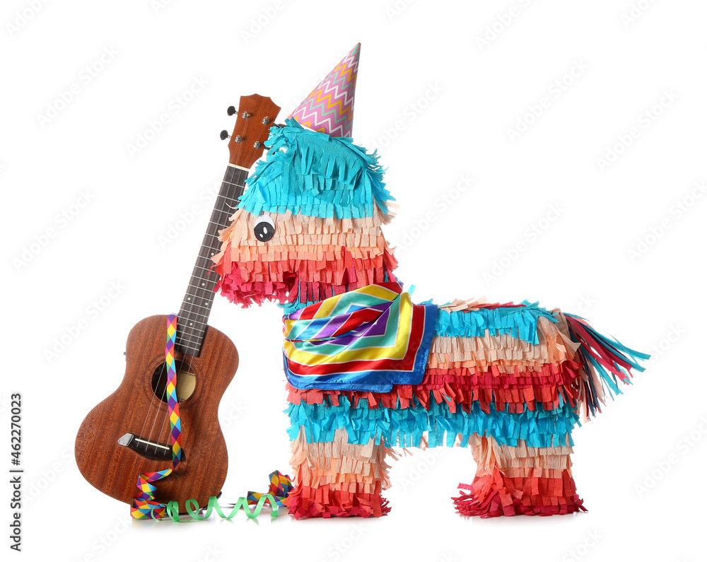 Mexican pinata with party hat and guitar on white background