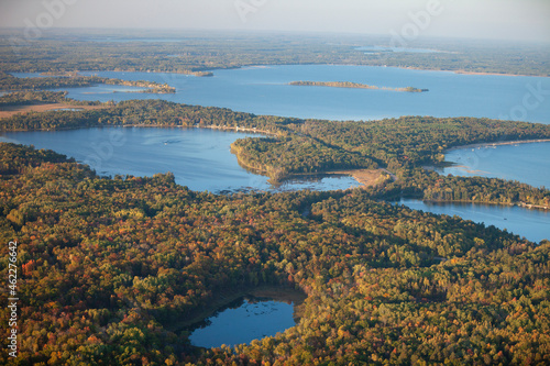 Fototapeta Naklejka Na Ścianę i Meble -  Aerial view of lakes and trees in autumn color near Brainerd Minnesota