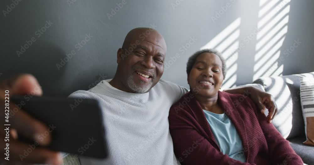 Happy african american senior couple taking selfie and having fun Happy african american senior couple taking selfie and having fun