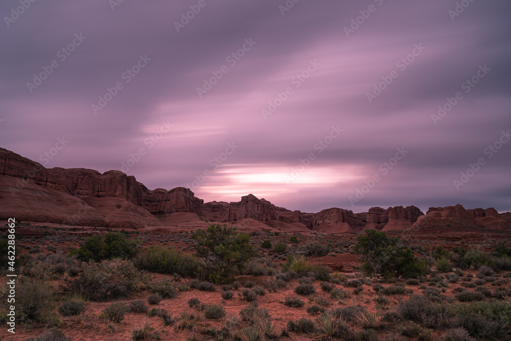 Long exposure sunset sky over desert landscape in Arches National Park, Utah Long exposure sunset sky over desert landscape in Arches National Park, Utah