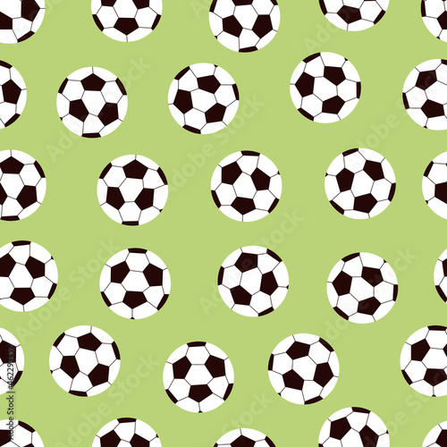 Seamless pattern with soccer balls on green background. Vector illustration.