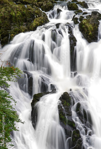 long exposure of white water cascading over the magnificent Rhaeadr Ewynnol Swallow Falls Waterfall  Betws-y-coed  Snowdonia National Park  Wales UK