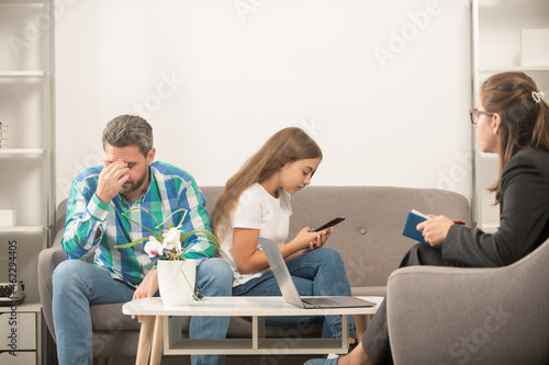 worried father talk to family psychologist about phone addicted child, relationship