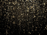 Shinny round gold glitters against black. Glittering texture abstract background.
