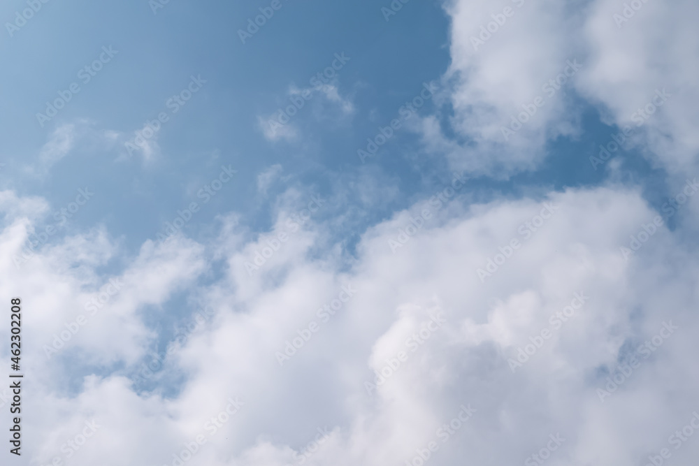 Soft fluffy clouds on blue sky. Smooth sunlight aloof Soft fluffy clouds on blue sky. Smooth sunlight aloof