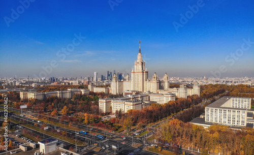 Aerial dron panoramic view of campus buildings of famous Moscow university under blue sky in early autumn