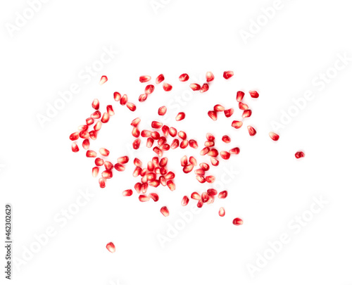 Fototapeta Naklejka Na Ścianę i Meble -  Scattered Pomegranate Seeds Isolated on White Background
