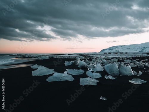 Landscape View Of The Amazing Jokulsarlon Beach Diamond Beach With Giant Ice Rocks On The Lava Black Beach, Shine Like Crystal Diamond Under Sunrise, Glacier Lagoon Jokulsarlon, Iceland