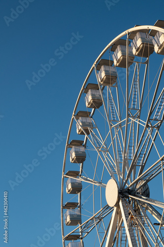 Ferris wheel entertainment. Blue sky