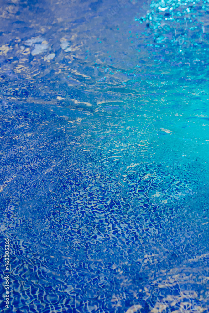 Blue neon water texture. Beautifully highlighted water texture