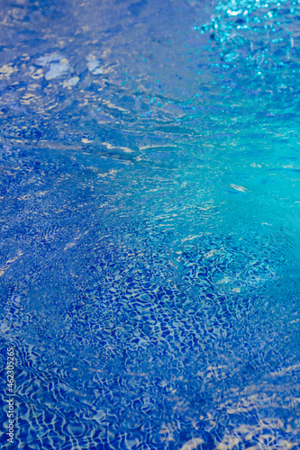 Blue neon water texture. Beautifully highlighted water texture