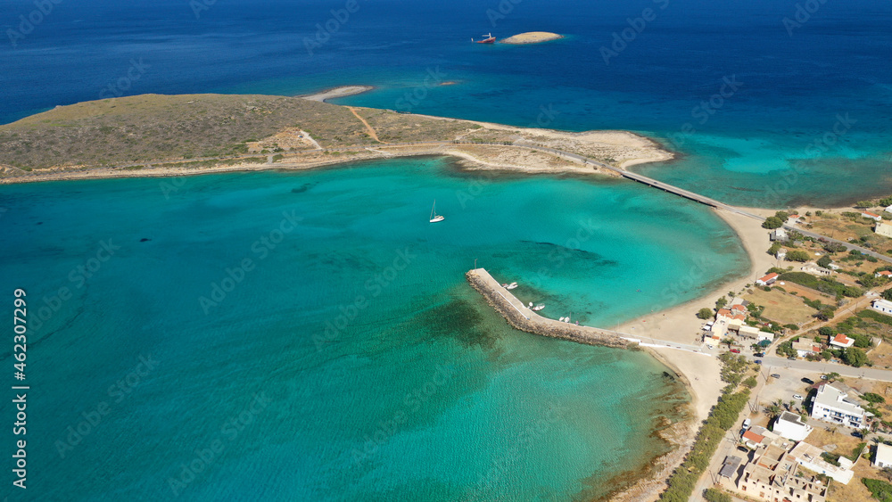 Aerial drone photo of main port of Kythera island and turquoise exotic beach of Diakofti, Ionian, Greece