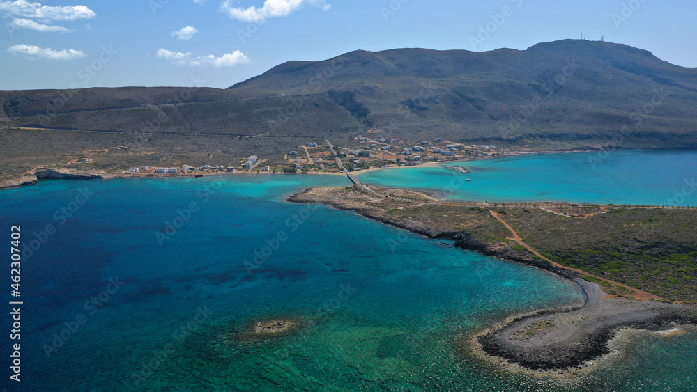 Aerial drone photo of main port of Kythera island and turquoise exotic beach of Diakofti, Ionian, Greece