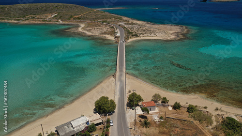 Aerial drone photo of main port of Kythera island and turquoise exotic beach of Diakofti, Ionian, Greece photo