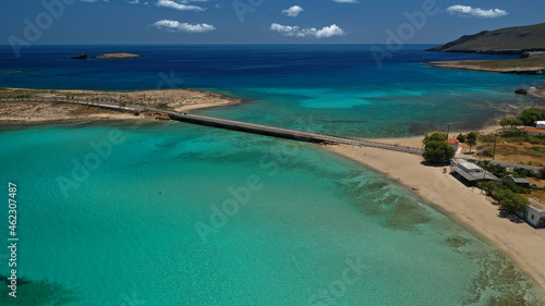 Aerial drone photo of main port of Kythera island and turquoise exotic beach of Diakofti, Ionian, Greece