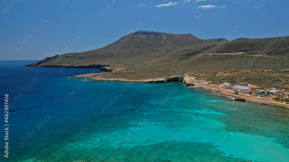 Aerial drone photo of main port of Kythera island and turquoise exotic beach of Diakofti, Ionian, Greece