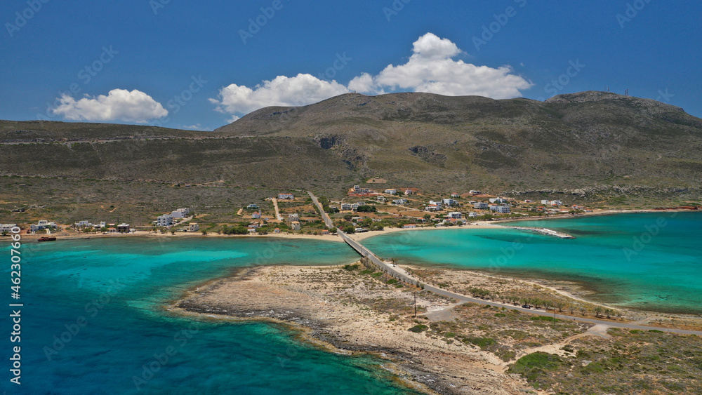 Aerial drone photo of main port of Kythera island and turquoise exotic beach of Diakofti, Ionian, Greece Aerial drone photo of main port of Kythera island and turquoise exotic beach of Diakofti, Ionian, Greece
