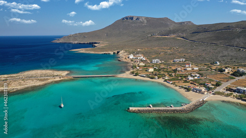 Aerial drone photo of main port of Kythera island and turquoise exotic beach of Diakofti, Ionian, Greece © aerial-drone