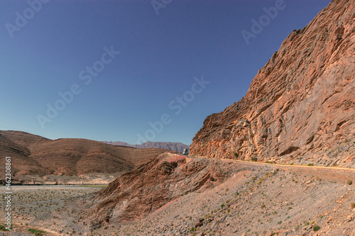 Africa Morocco desert Atlas mountains nature rock landscape with river palm under blue sky hot weather 