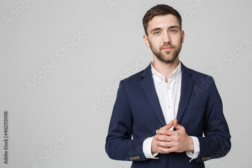 Business Concept - Portrait Handsome Business man holding hand with confident face. White Background. Copy Space. photo