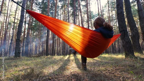 woman swinging in a hammock